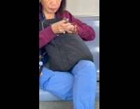 Woman clip her nails inside subway train