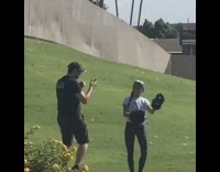 Girl two black bear paws over hands 