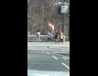Lady in bird outfit dances for video 