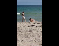 Girl in black sleeveless crop top films her part 2