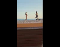 Woman black bikini different pose beach part 1