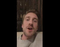 Guy wearing grey cornell law school sweater