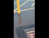 Small chunk of hail started to fall outside the hardware store