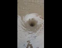 Dirty flood makes whirlpool with weird sounds