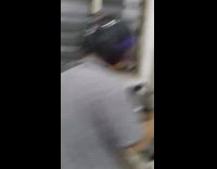 Man wears helmet to prevent head from hot oil