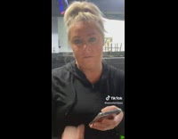 Girl in black shirt lets out a loud hey