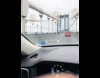 Random guys rides electric skateboard on bridge