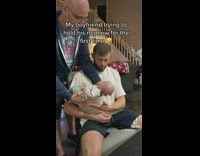 Boyfriend try to hold nephew first time