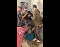 Guy does a keg stand, friends drop him in corner 