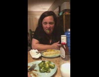 Black shirt mom spits out brussels sprouts 