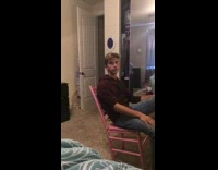 Guy falls back in pink chair, dont judge a book by its cover