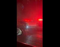 Firefighters responding to burning car on highway