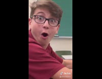 Man punches laptop and snaps its body