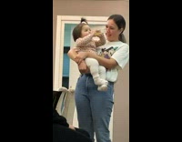 Toddler girl dances after drinking juice 