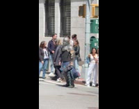 Man wear medieval armor wait on crosswalk