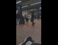 Guy freestyling about grilled cheese and another guy dances