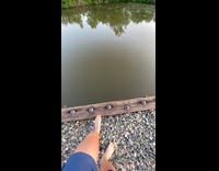 Guy makes massive bridge jump to river