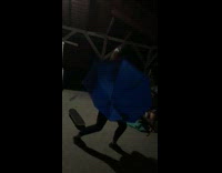 NOT SUITABLE FOR USE Blue Umbrella Girl Trips On Skateboard