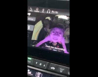 Boy enjoys fisheye camera inside the car