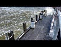 Slow motion water pass through pier holes