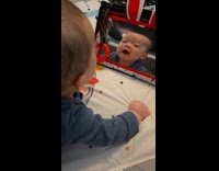 Baby laughs at self in the mirror part 2
