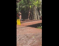 Woman bikini lean hold dried vines pictorial