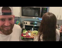 Taking picture of charcuterie board on black stove