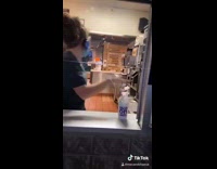 Girl in drive thru gives worker milk shake