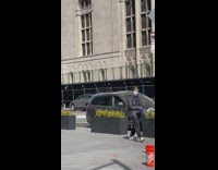 Guy with pants down blows into horn