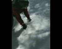 Guy skis off wooden platform and falls off