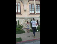 Woman same dress wall pattern middle finger