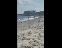 Woman bikini crawls beach waves outbalanced pictorial Part 2