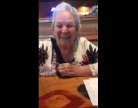 Grandma and granddaughter get drinks and cheers 