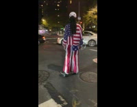 Guy american flag print shirt pants skateboards