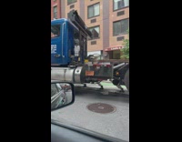 Truck drives over cones with one wheel levitating 