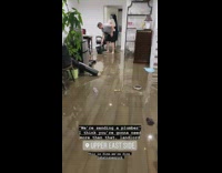 Apartment tenants try to stop flood from destroying unit 