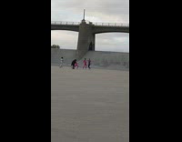 Four people dance group empty water canal