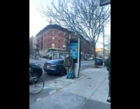 Guys plays apple vision charge on street