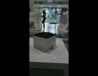 Girl dances in building lobby