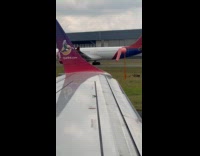 Bug clings on airplane wings for takeoff