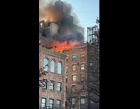 Building roof on fire with black smoke Part 2