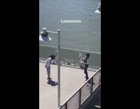 Woman white sweater flex money video shoot