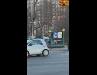 Men Carries Bed Mattress into Subway Station