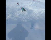 Skier double spins off ramp and lands on side