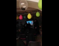 Person in unicorn costume chugs the bottle