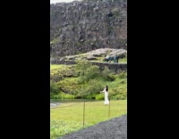 Collab IITW - Woman white dress poses beside park river