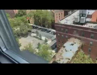 Lady sits white chair broken fire hydrant