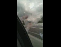 Condom blows up by the wind on the freeway