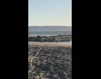 Woman take pose at the beach 