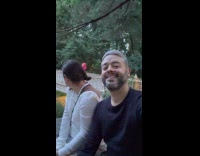 Man purple tight suit head mask run on bridge